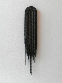 Skluptur aus gebrauchten Fahrradketten.